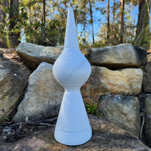 pointed wooden finial painted white